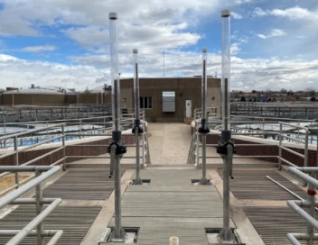 Symmetrical walkway between treatment basins at South Platte Water Renewal Partners facility